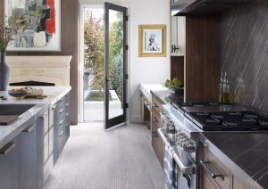 a kitchen with a glass door